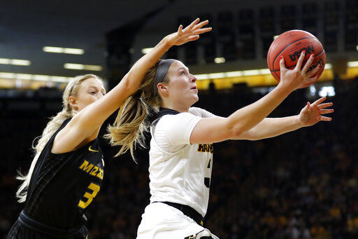Gustafson, Iowa blow past Missouri 68-52